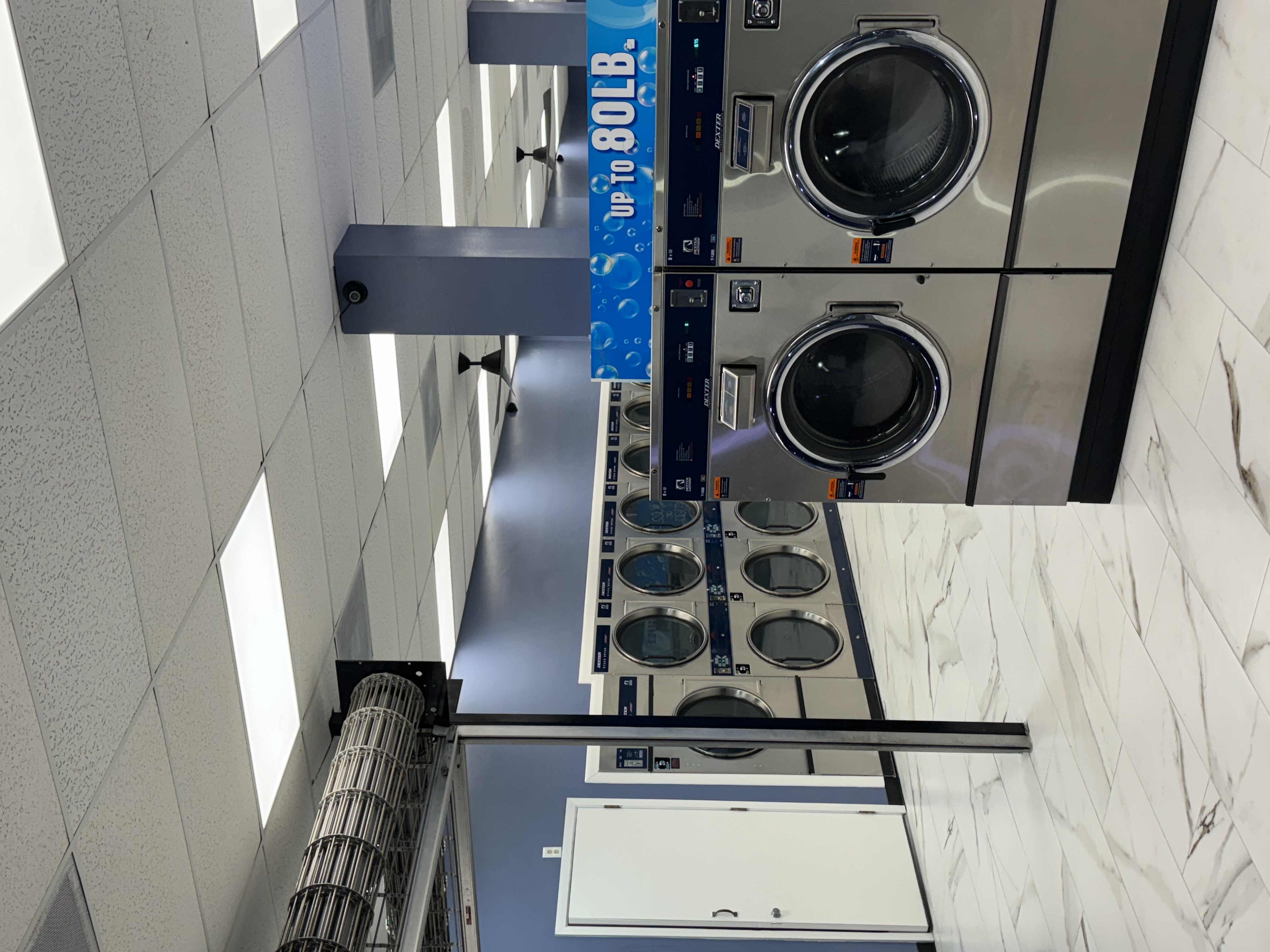 Up to 80 lb large-capacity machines on marble-look floor